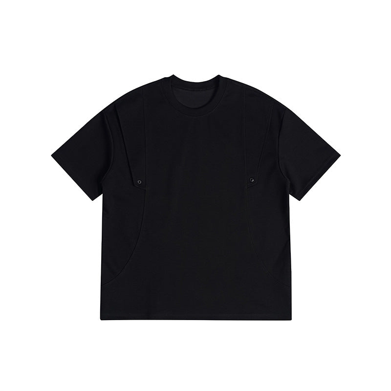 Black short-sleeve crew-neck T-shirt with curved front seams and two small snap fasteners, flat lay