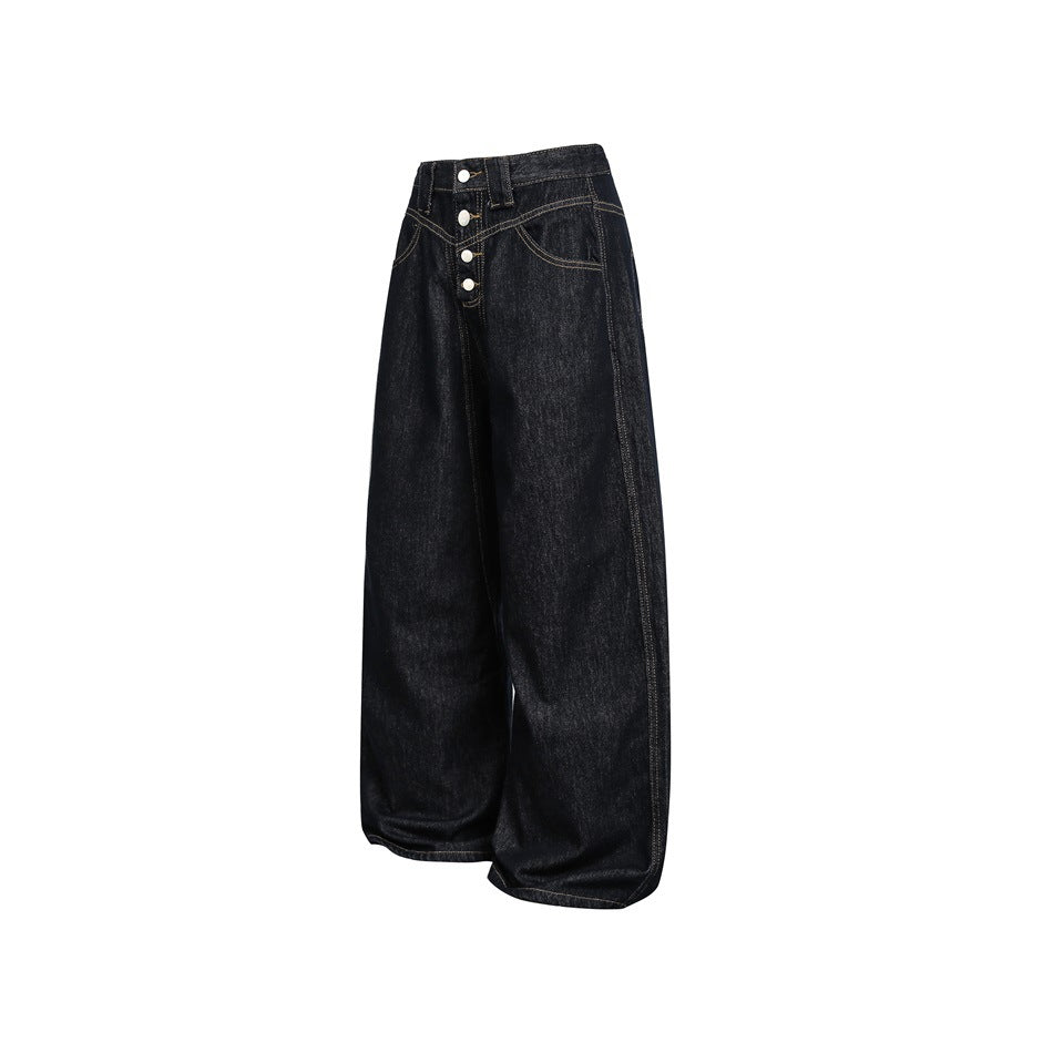Front view of dark indigo wide-leg jeans with a four-button closure and contrast stitching.