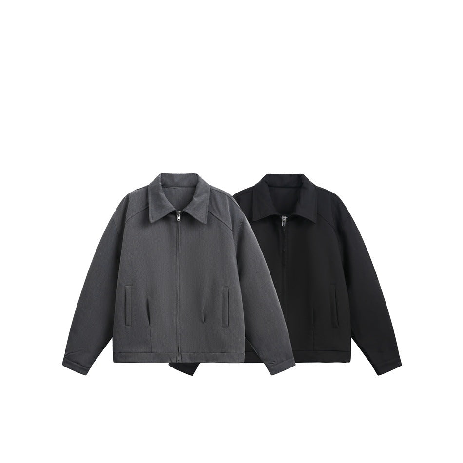 Two collared zip jackets shown together, one charcoal gray and one black, against a white background.