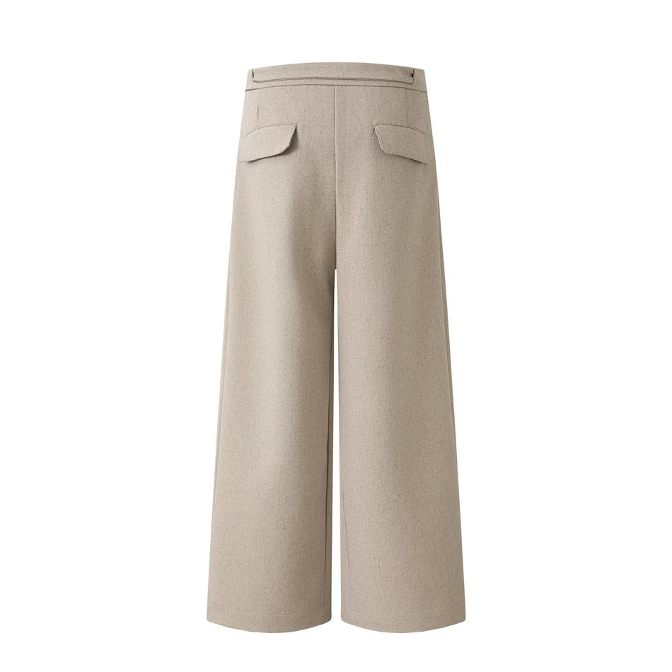 Back view of taupe wide-leg trousers with two flap pockets and a clean waistband.