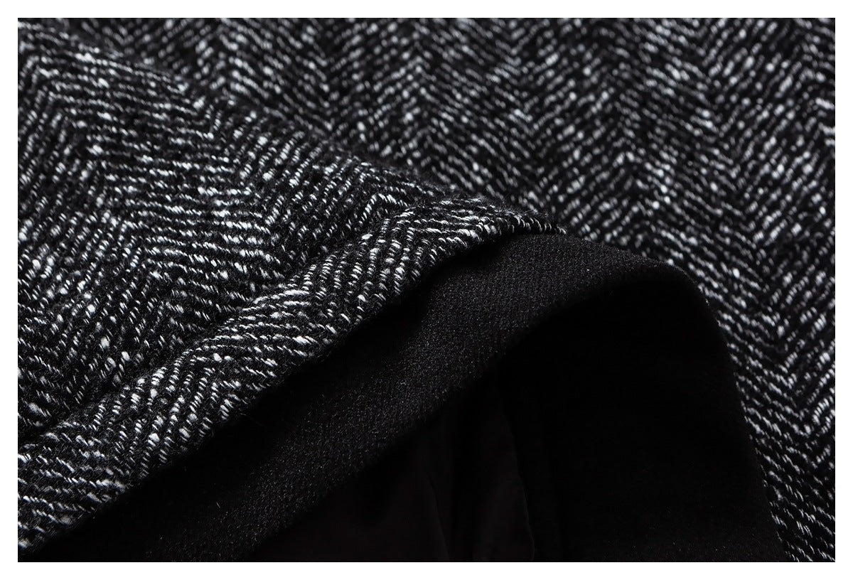 Close-up showing black-and-white herringbone fabric folded back to reveal a black underside.