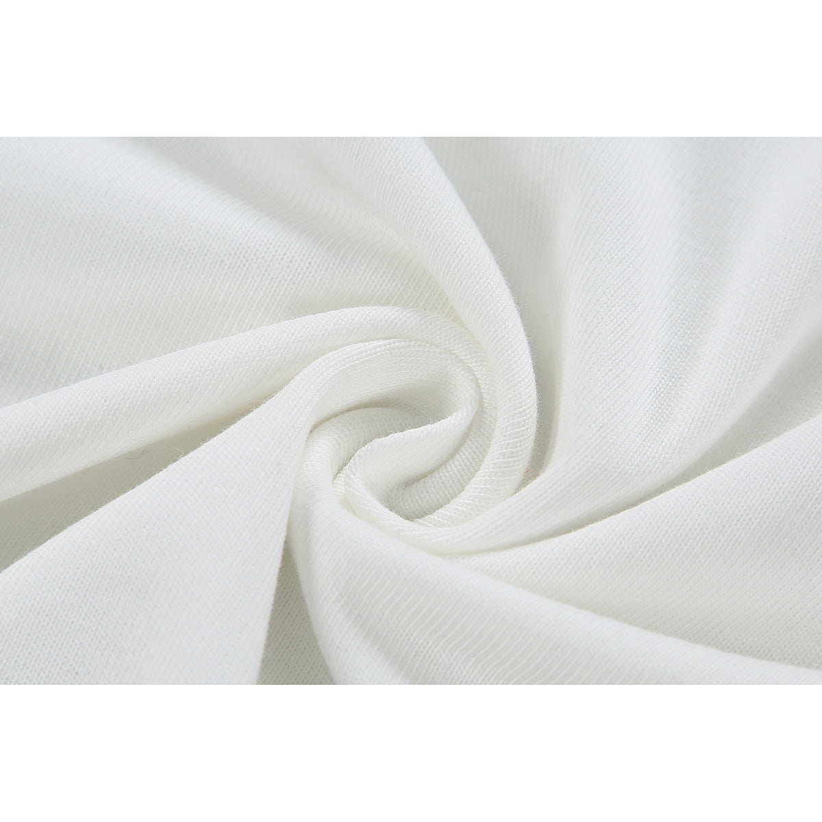 Close-up of white knit fabric gathered into a soft spiral fold.