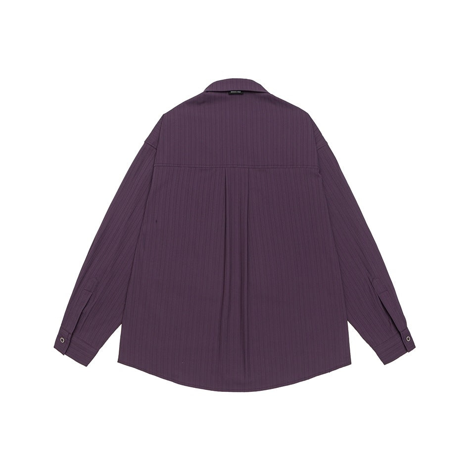 Back view of a plum-purple long-sleeve shirt with a pointed collar, vertical ribbed texture and curved hem.
