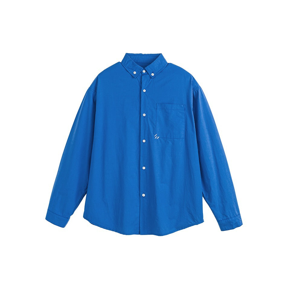 Bright blue long-sleeve button-down shirt flat lay with chest pocket and small white stitched slash mark