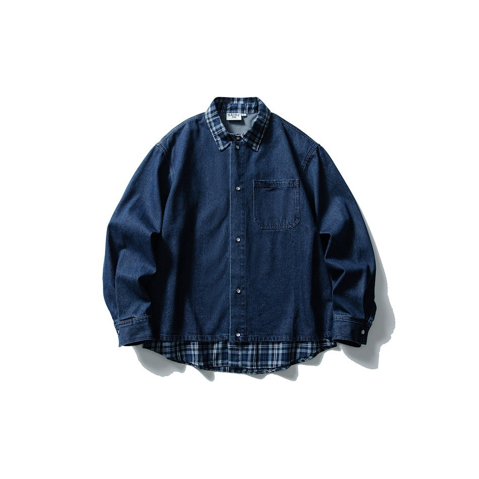 Blue denim shirt with plaid collar and plaid layered hem, flat lay front view