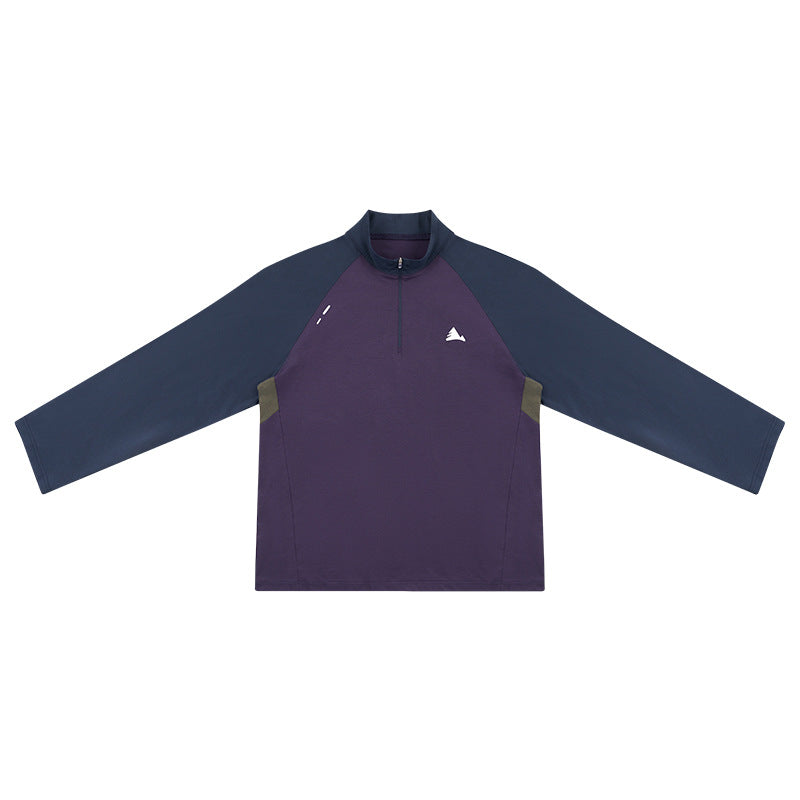 Dark purple quarter-zip long-sleeve top with navy raglan sleeves and collar, flat lay front view