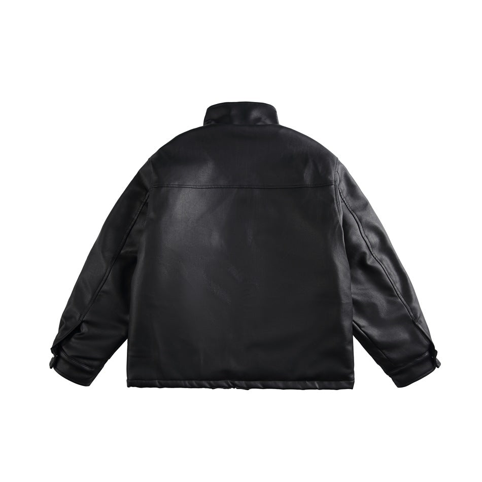 Back view of black padded faux-leather jacket with stand collar, back yoke seam and cuff tabs, flat lay