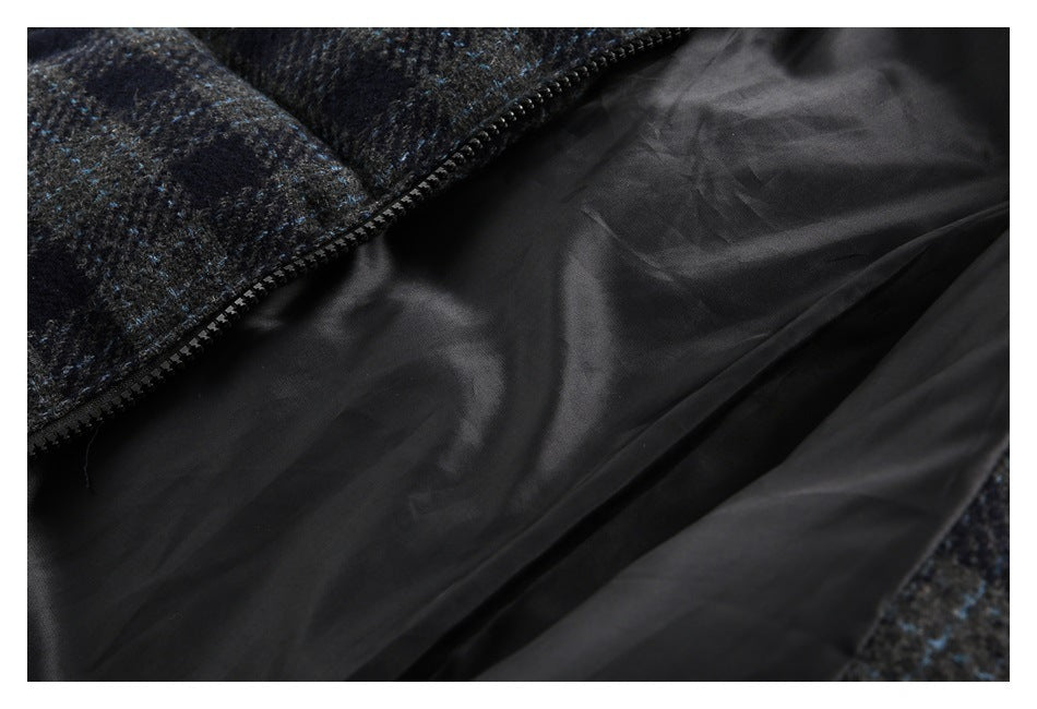 Close-up of black lining and zipper beside the dark blue-flecked outer fabric.