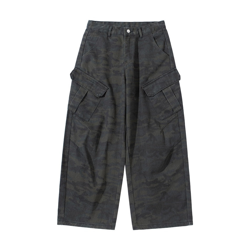 Dark camouflage wide-leg cargo pants, front view with large side flap pockets and button fly