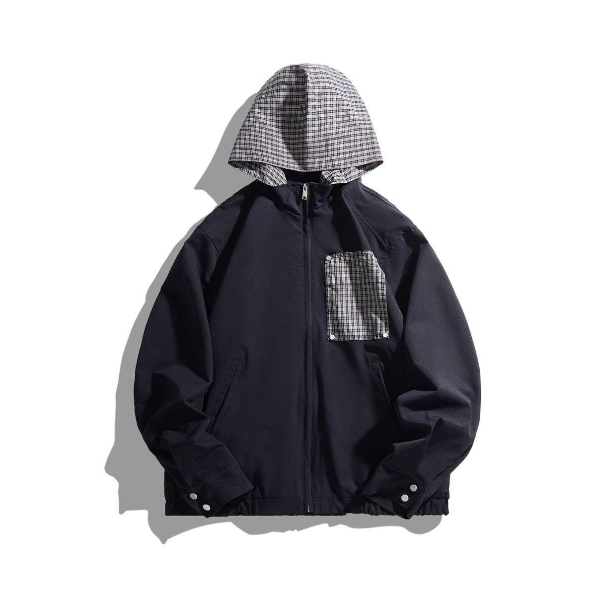 Dark navy blue-black zip jacket with plaid hood, plaid snap chest pocket, slash pockets and elastic hem, flat front view