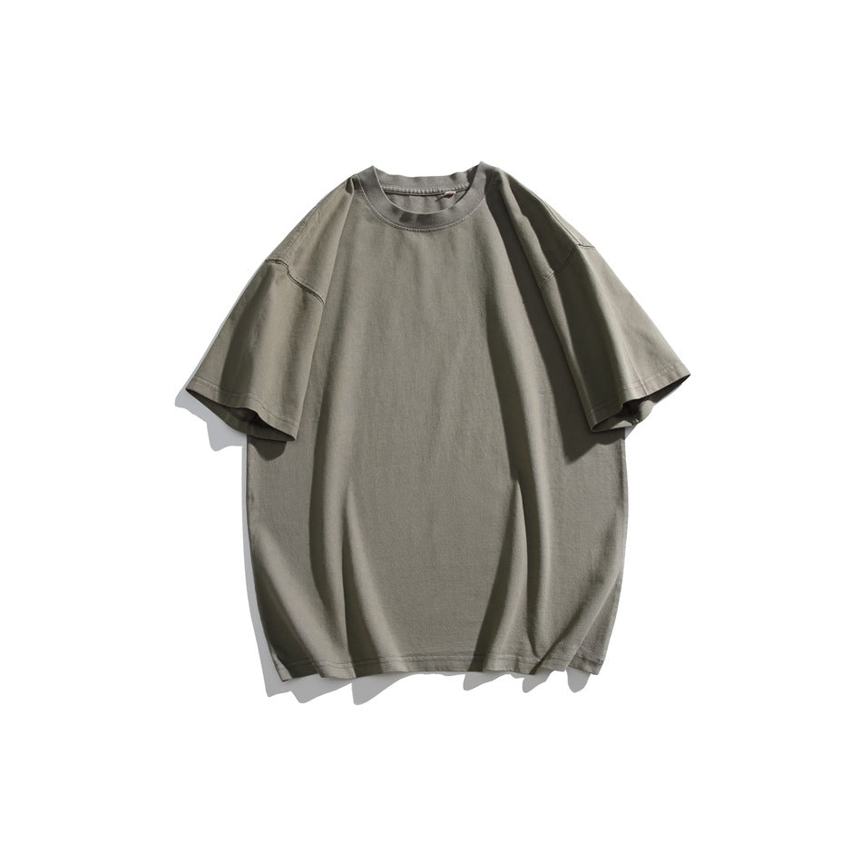 Gray-green short-sleeve crew neck T-shirt with dropped shoulders, flat lay on a white background