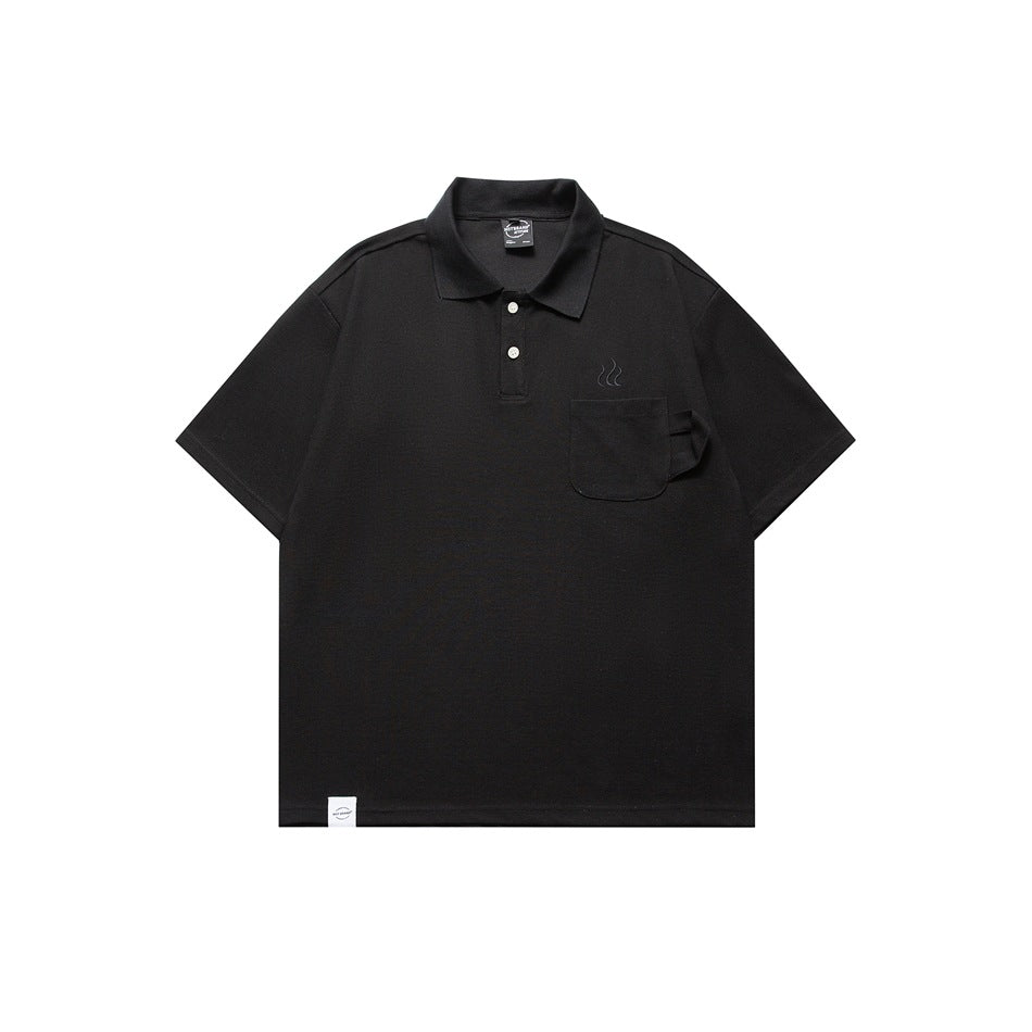 Black short-sleeve polo shirt with chest pocket and small embroidered steam motif, flat front view