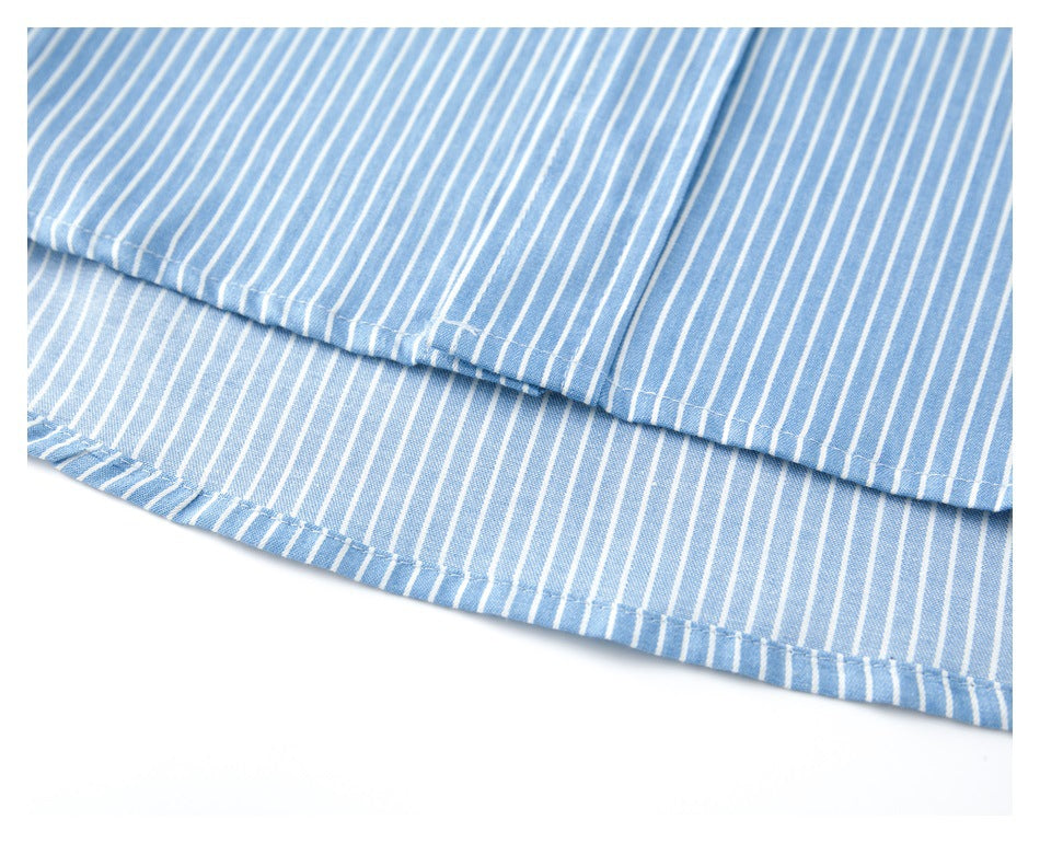 Close-up of the blue-and-white striped shirt's layered lower hem and stitching.