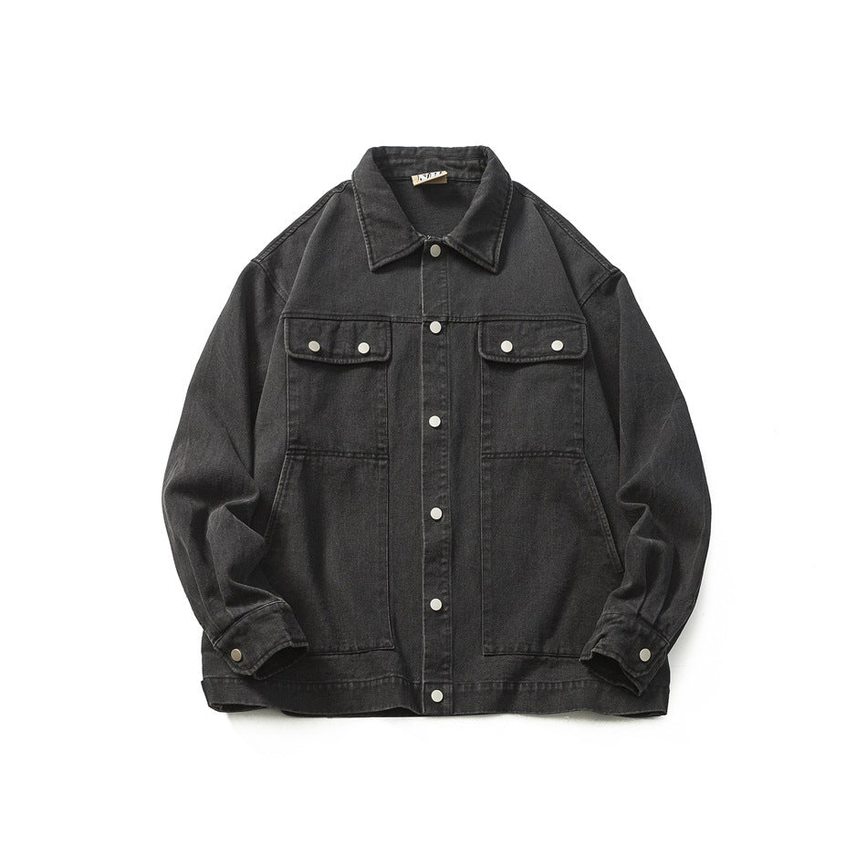 Black washed denim-style jacket flat lay, front view with collar, snap buttons and flap pockets