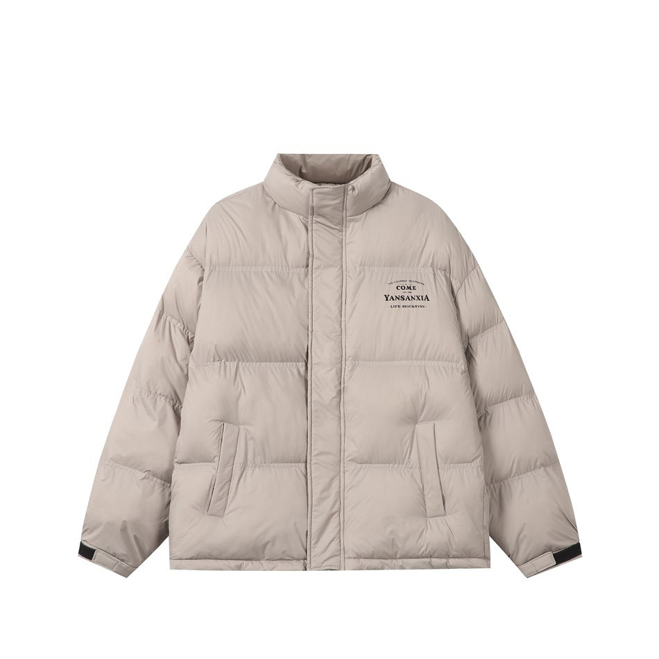 Light khaki stand-collar quilted puffer jacket, front view, with zip placket, pockets and cuff tabs