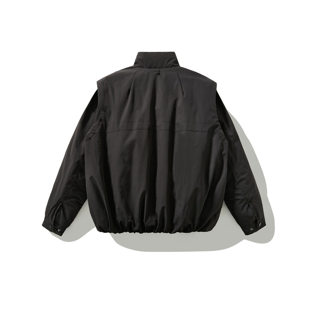 Back view of a black jacket with a high collar, long sleeves, and gathered hem.