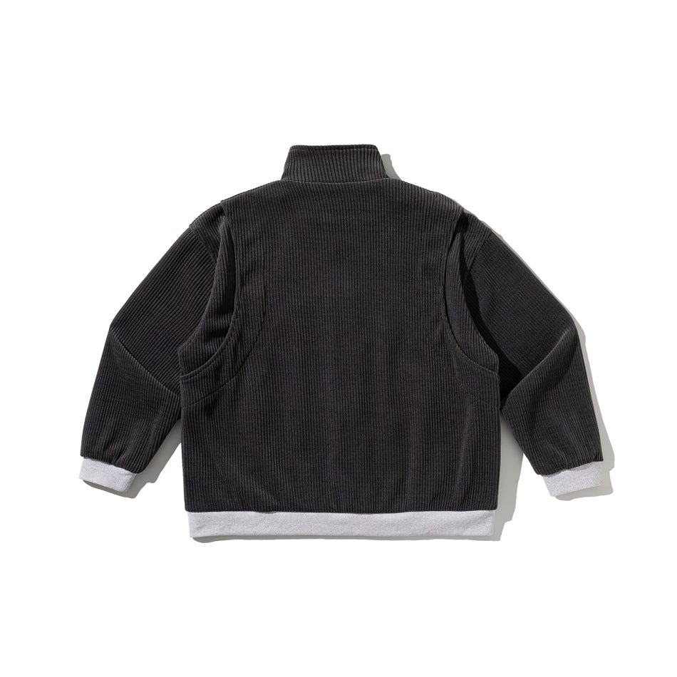 Back view of a black ribbed zip-up jacket with light gray cuffs and hem.