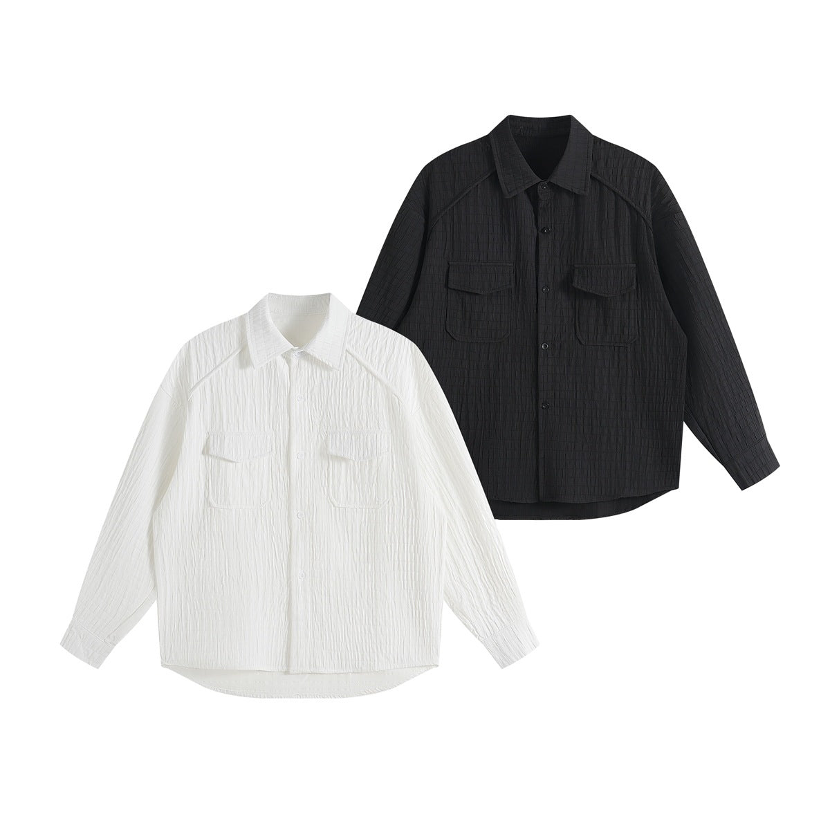 White and black long-sleeve button-up shirts with pointed collars, raglan seams, and two flap chest pockets.