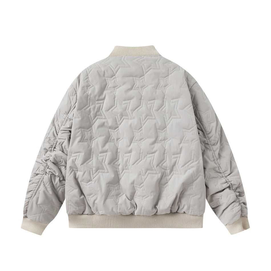 Back view of a light gray bomber jacket with all-over star quilting and cream ribbed collar, cuffs, and hem.