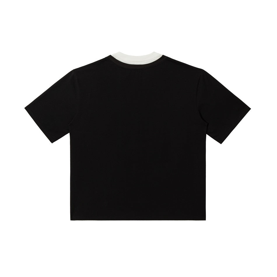 Back view of a plain black short-sleeve T-shirt with a white layer visible at the crew neck.
