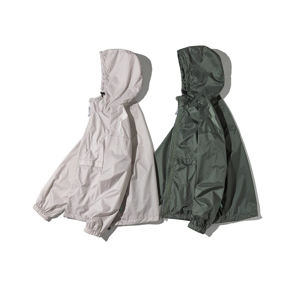 Side views of hooded jackets in light taupe and dark olive, showing their profiles and front zippers.