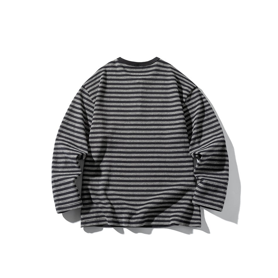 Back view of a black and gray horizontally striped long-sleeve shirt, displayed flat against a white background.