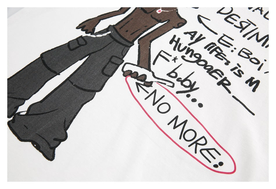 Close-up of the white T-shirt print showing the cartoon figure's dark pants and a pink-outlined phrase.