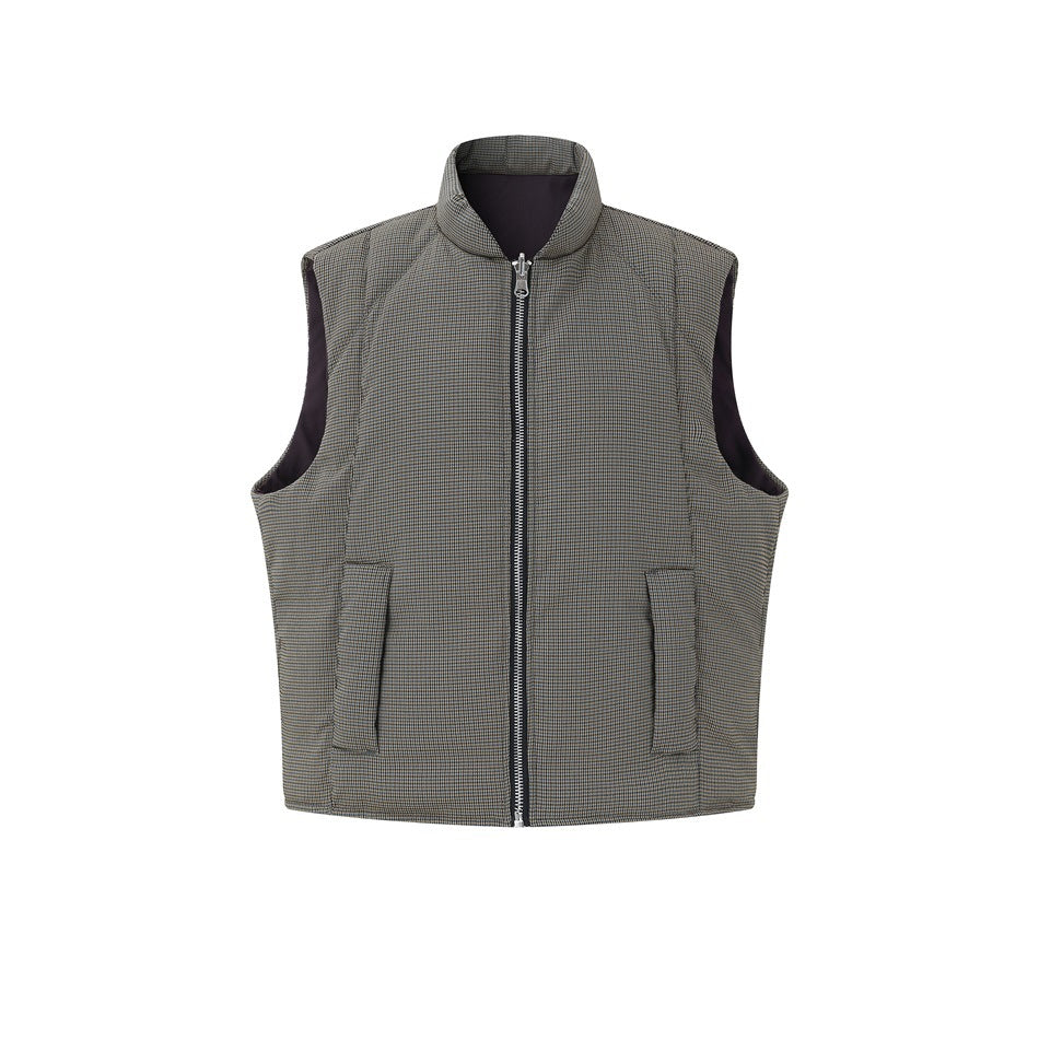Front flat lay of gray houndstooth quilted vest with stand collar, silver zipper and two flap pockets