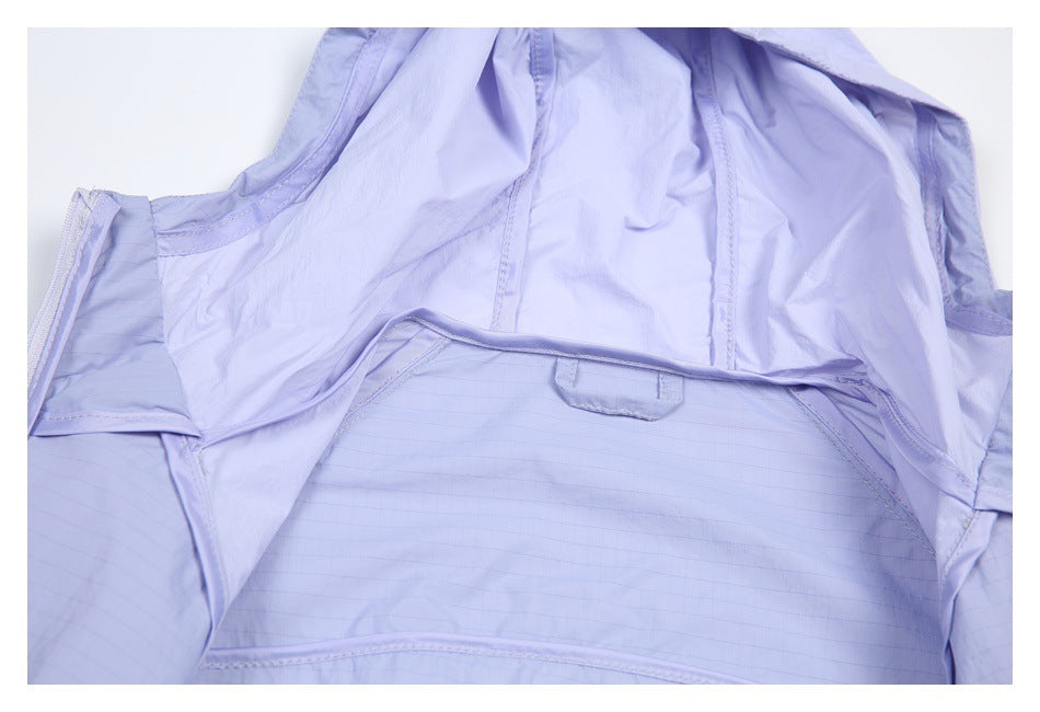 Close-up of the lavender garment's inner construction, seams, and fabric panels.