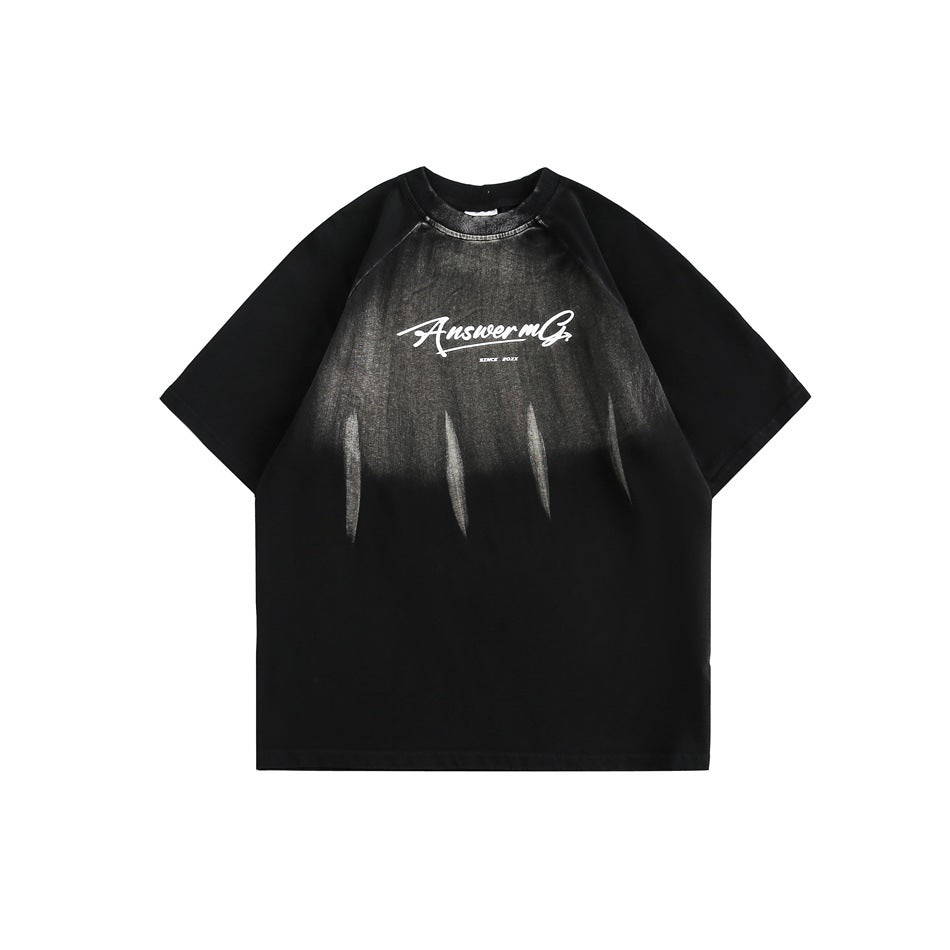 Black short-sleeve raglan T-shirt with faded gradient wash, claw streaks and white script chest graphic