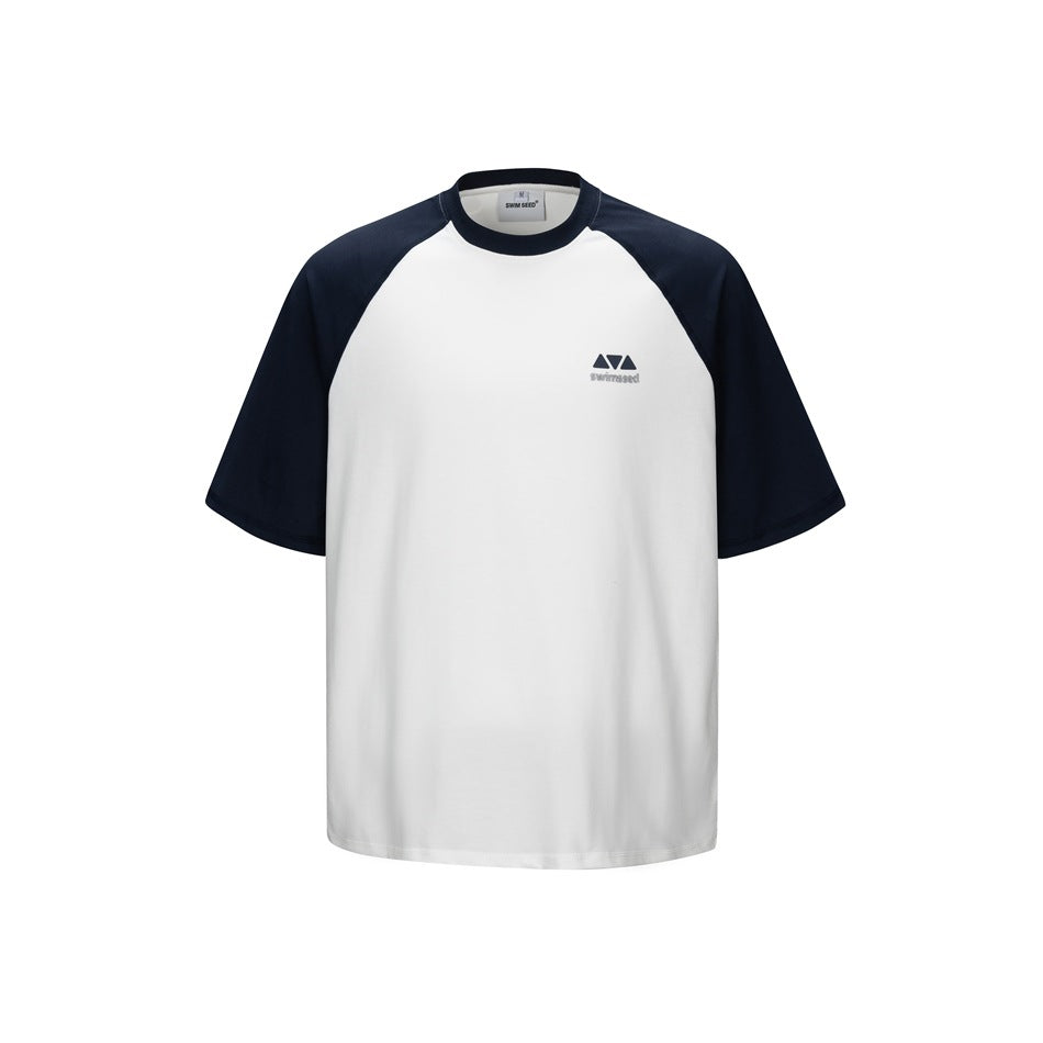 Front of a white crew-neck T-shirt with navy raglan sleeves and collar and a small chest logo on a white background