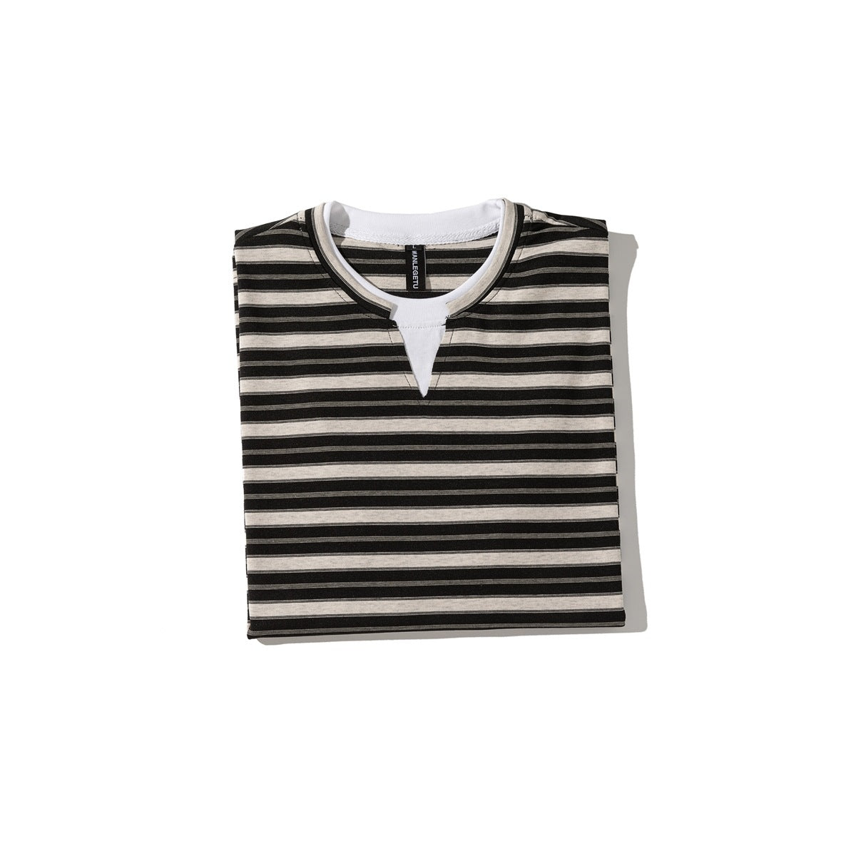 Folded front view of a black and beige striped short-sleeve T-shirt with a white-trimmed split neckline.