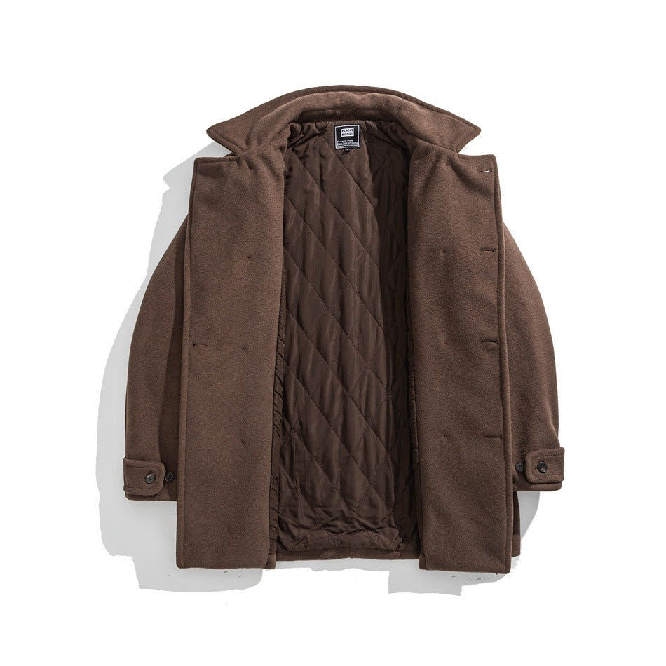 Brown coat laid open to show its front, wide lapels, and diamond-quilted lining.
