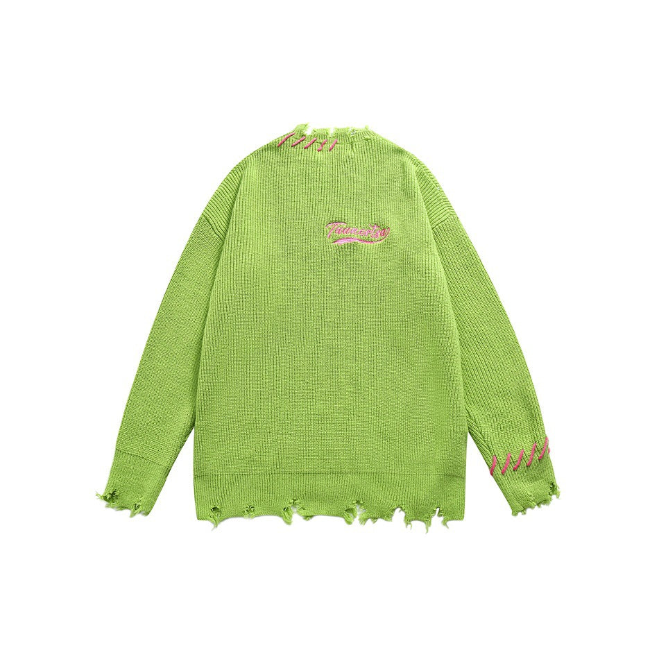 Bright green knit sweater with distressed edges, pink stitch accents, and matching script embroidery on the chest.