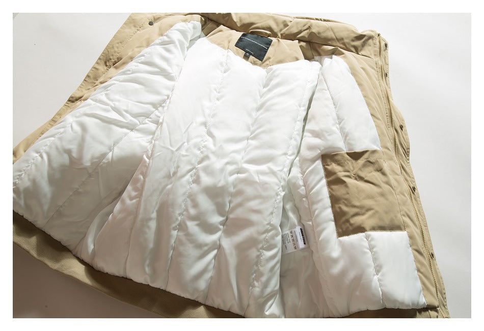 Tan jacket opened flat to show its white quilted lining and interior pocket.