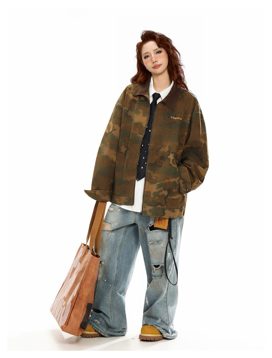 Full-length model wearing a brown and olive camouflage jacket with loose distressed light-wash jeans and boots.