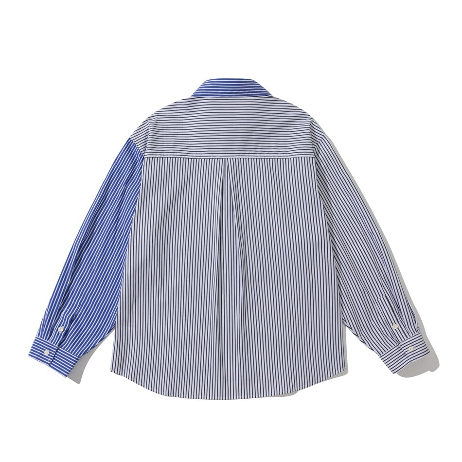 Back view of striped patchwork button-up shirt with center pleat, yoke and one blue striped sleeve