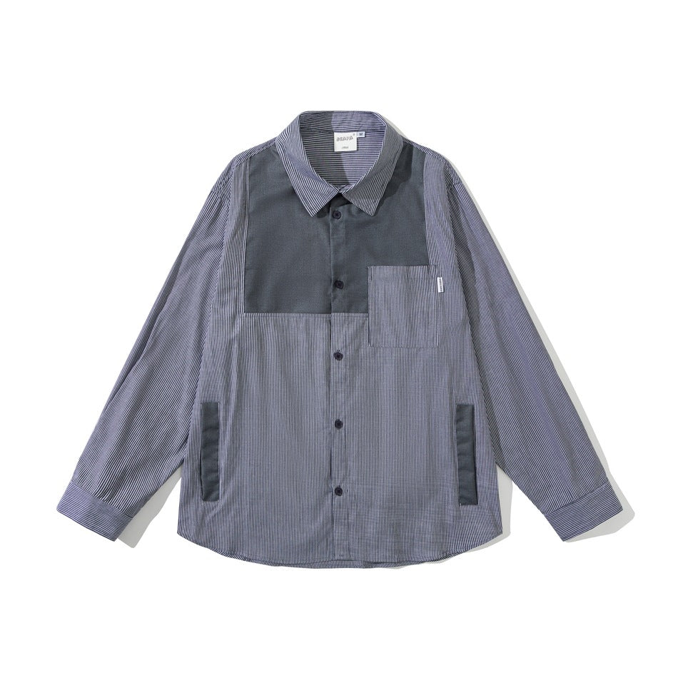 Flat lay front of a navy and white pinstripe long-sleeve shirt with a charcoal chest panel and patch pocket