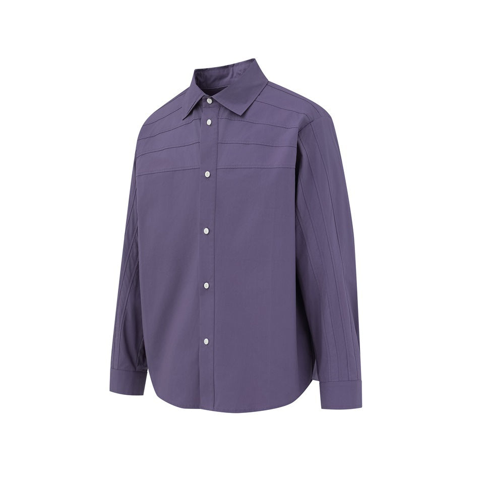 Front view of a purple long-sleeve button-up shirt with a pointed collar and horizontal stitched details across the upper