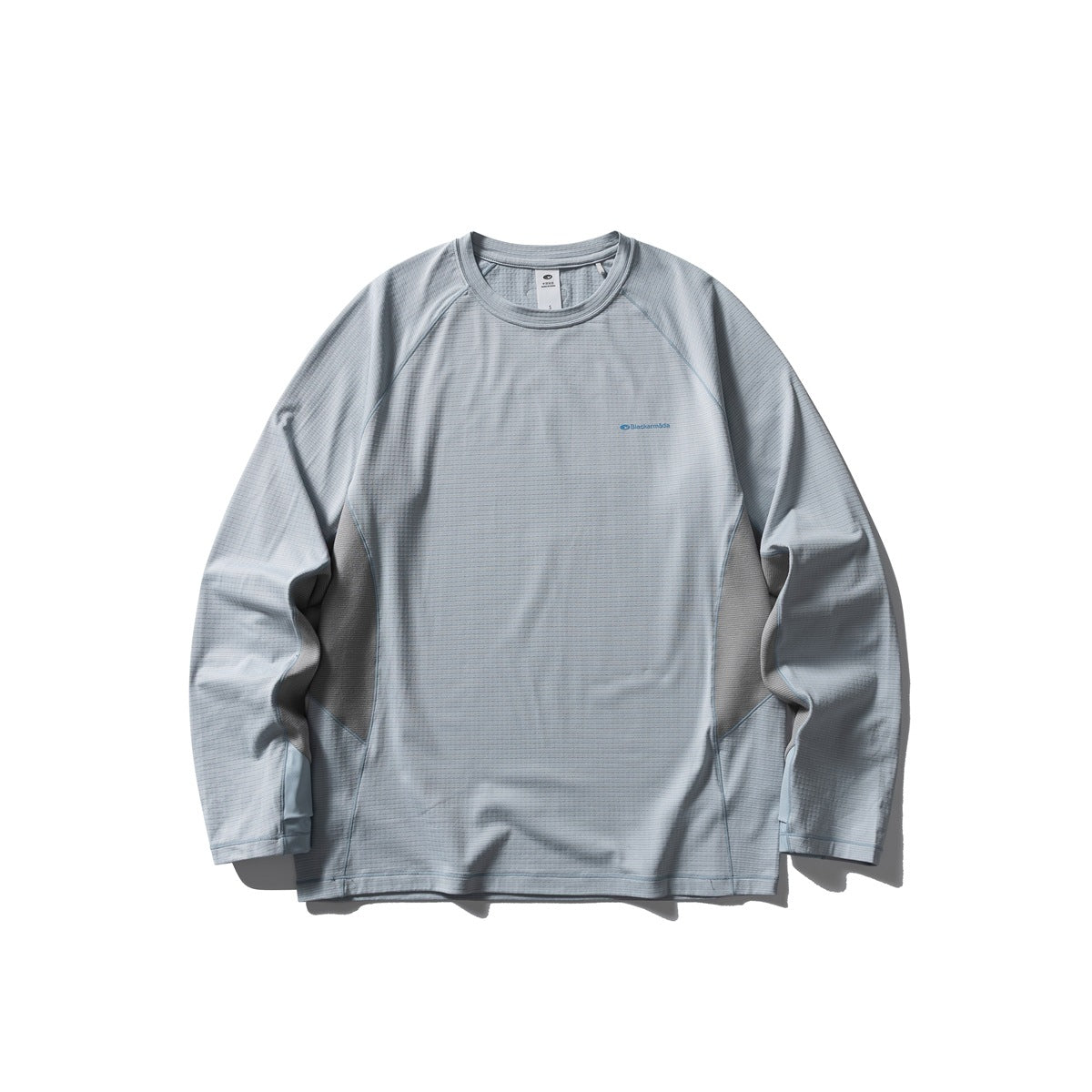 Frost blue long-sleeve crew-neck top with gray side panels and a small blue chest print, flat front view
