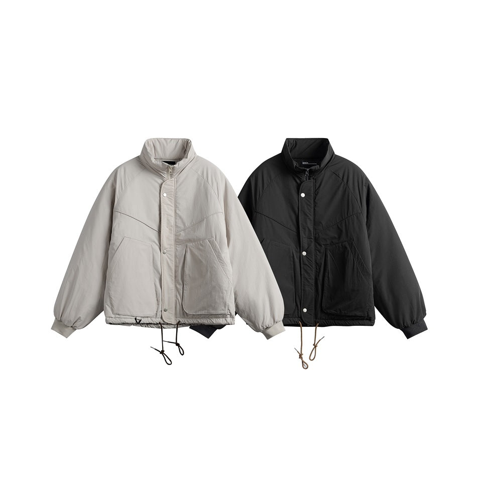 Front views of padded jackets in light gray and black, with stand collars and large pockets.