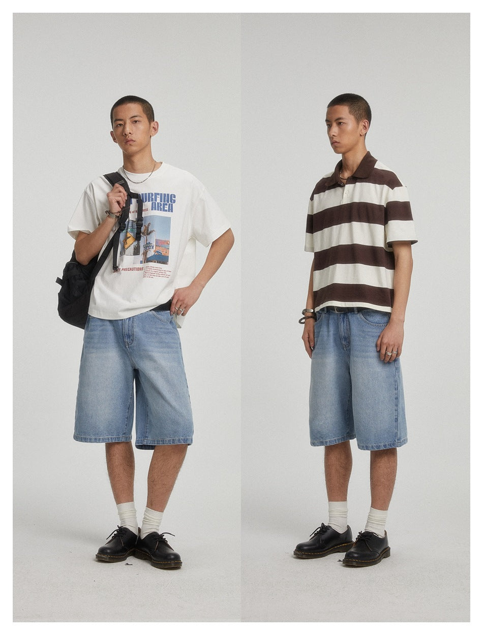 Two views of a man wearing light blue denim knee-length shorts with a graphic tee and a striped polo, with black shoes