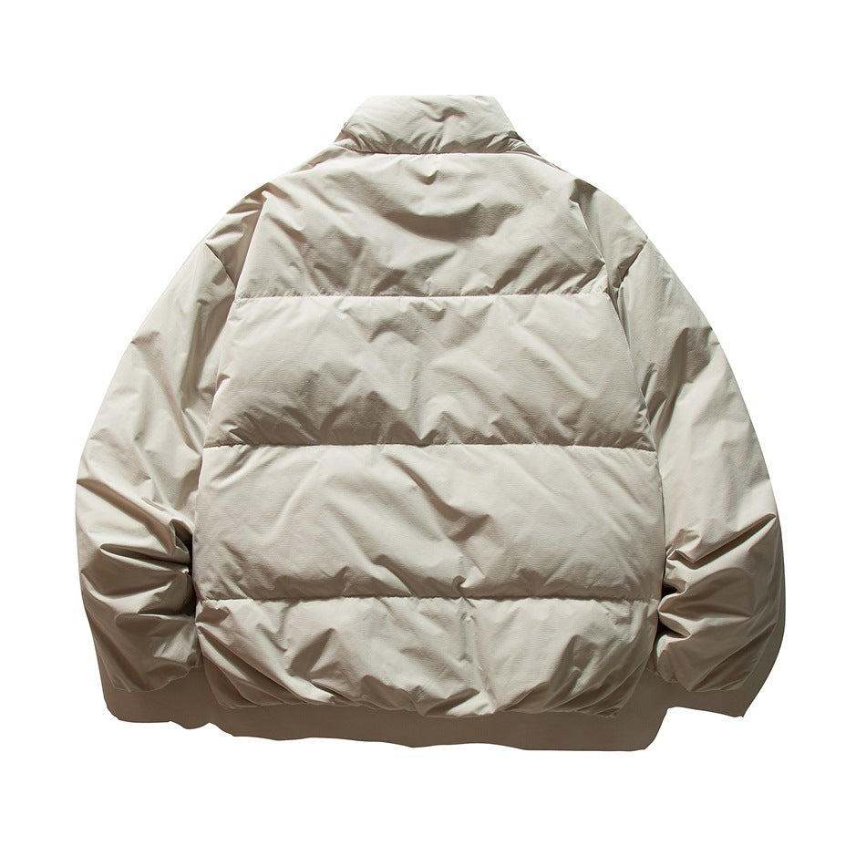 Back view of beige-gray puffer jacket showing horizontal quilted channels and stand collar