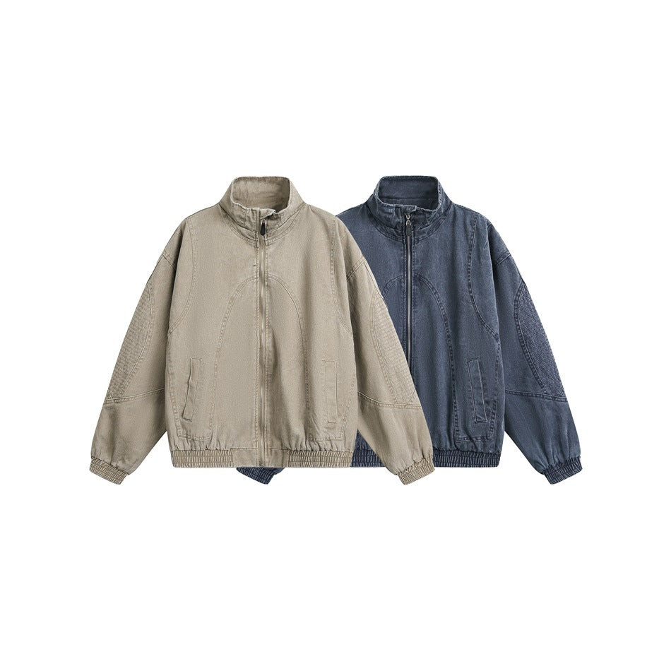 Two front views of zip-up jackets with stand collars, in tan and dark blue.