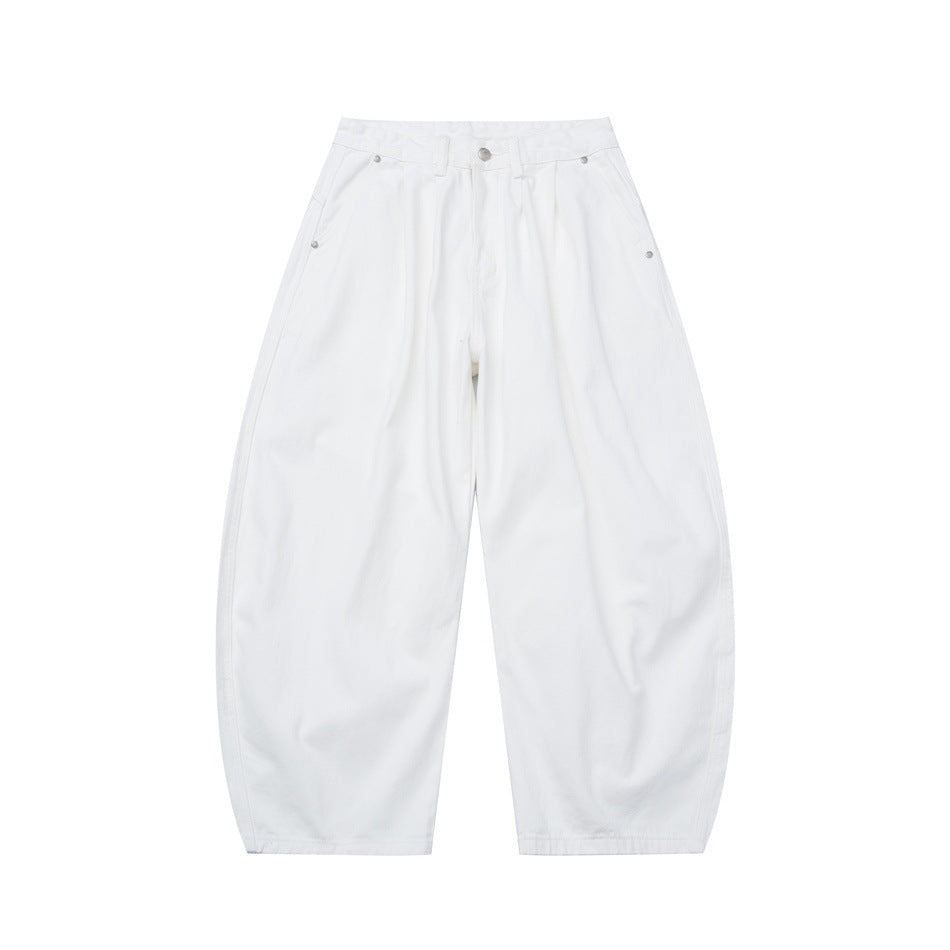 White wide-leg barrel pants, front view, with front pleats, waist button and rivet-accented side pockets