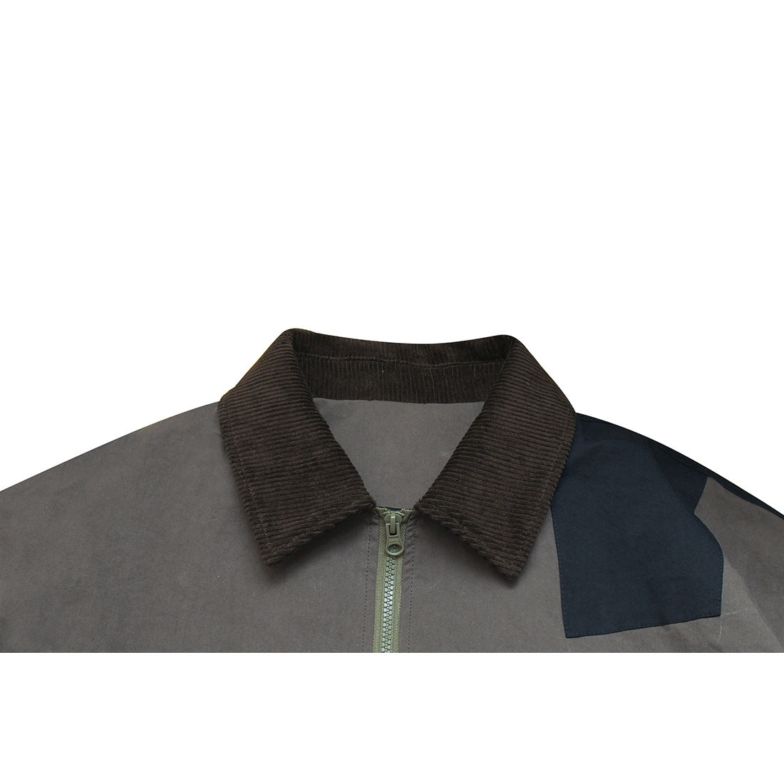Close-up of a gray jacket front with a dark brown ribbed collar, center zipper, and navy shoulder panel.