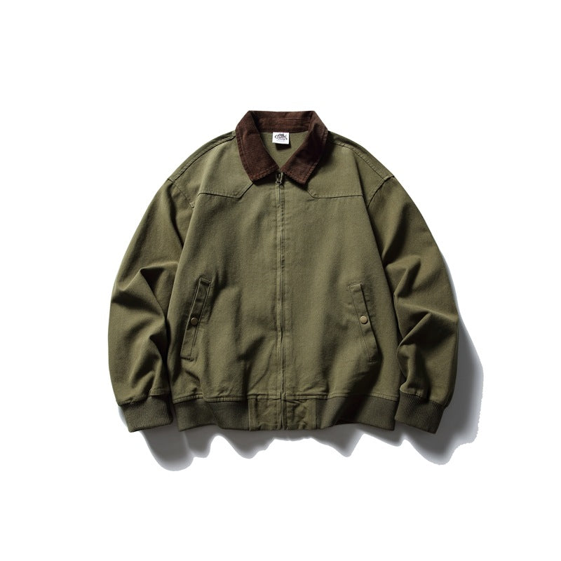 Olive green zip jacket with brown corduroy collar, snap-flap side pockets and ribbed cuffs and hem, flat lay