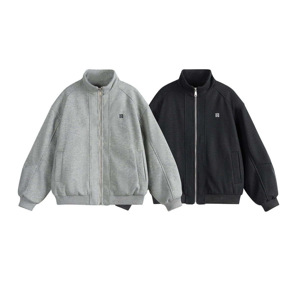 Front views of the zip-front jacket in gray and black, with stand collars and ribbed cuffs and hems.