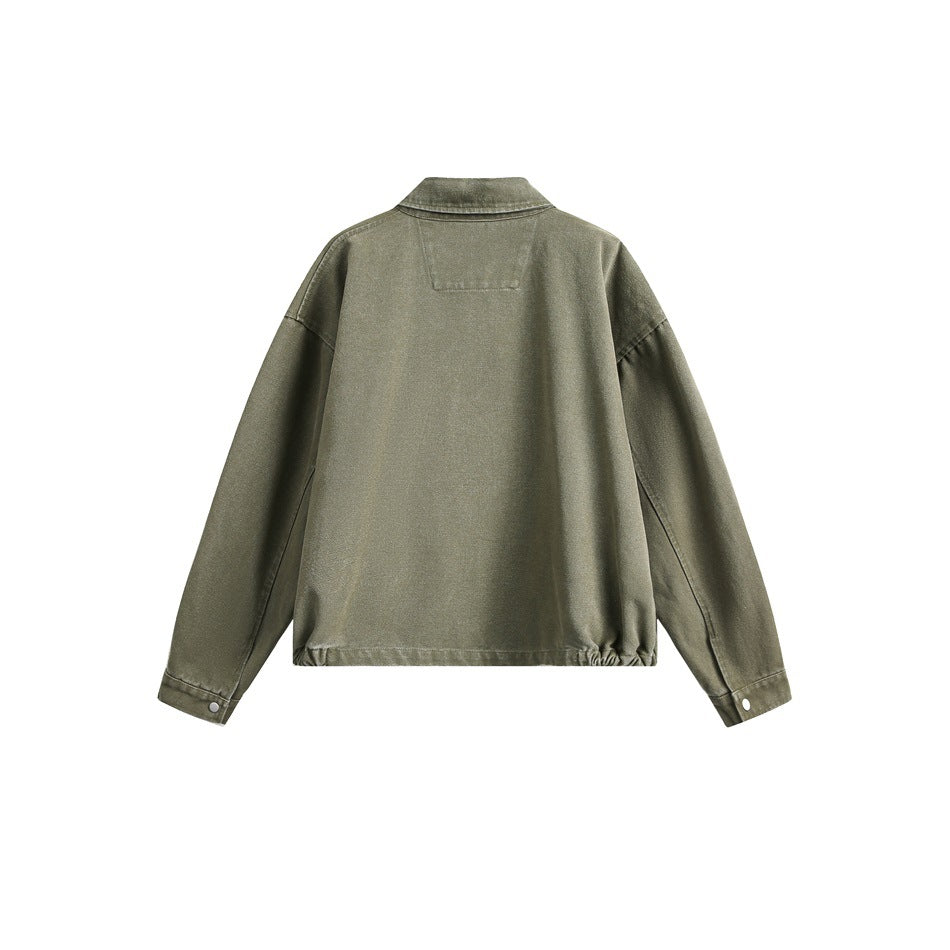 Back view of an olive green jacket with a pointed collar, dropped shoulders, long sleeves, and snap cuffs.