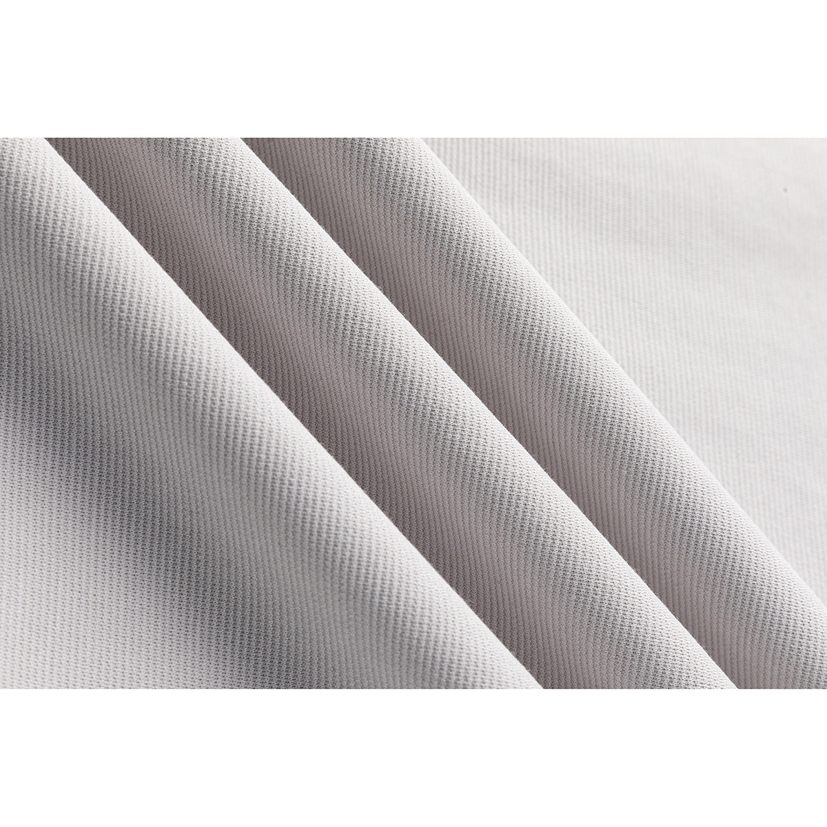 Close-up showing the fine textured knit of light gray fabric.